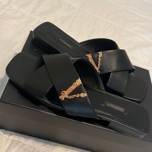 Gold and black leather Versace sandals